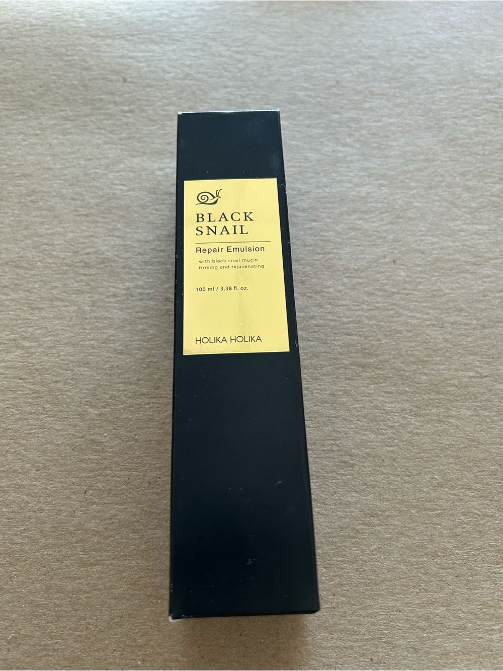 Holika Holika Black Snail Repair Emulsion - Black with Yellow Label